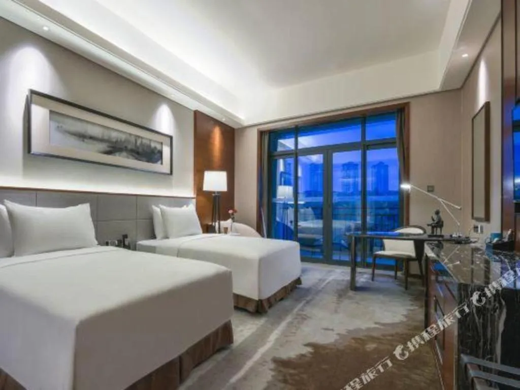 Bed in Country Garden Phoenix Hotel Yiyang