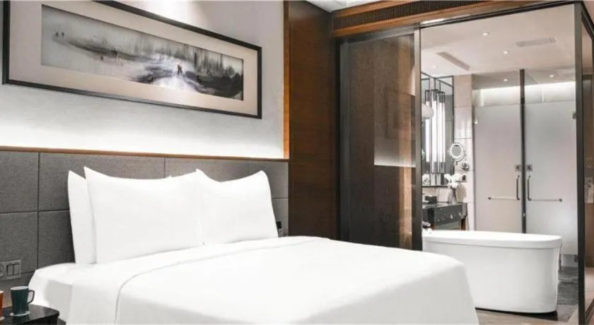 Bed in Country Garden Phoenix Hotel Yiyang