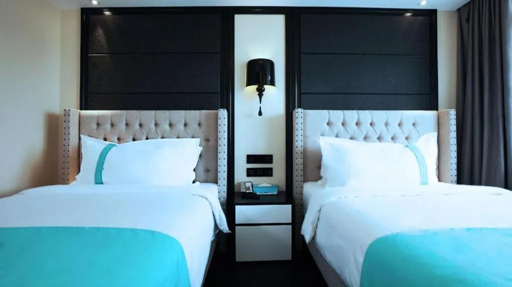 Bed in Xana Hotelle Tangshan North Railway Station