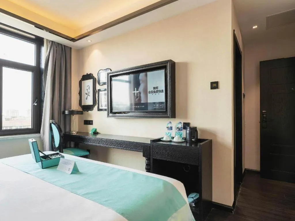 Bed in Xana Hotelle Tangshan North Railway Station