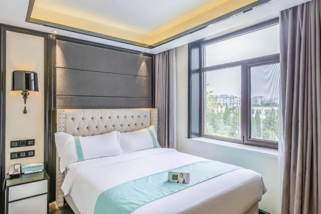 Bed in Xana Hotelle Tangshan North Railway Station