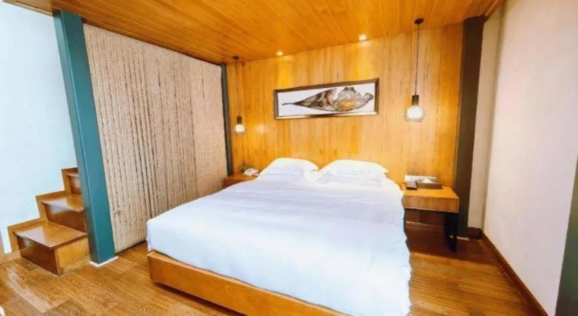 Bed in Ramada by Wyndham Guergou