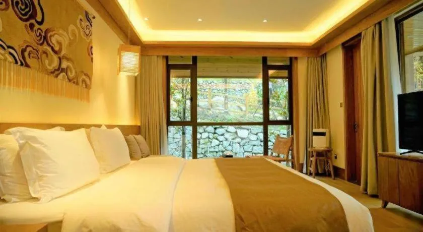 Bed in Ramada by Wyndham Guergou