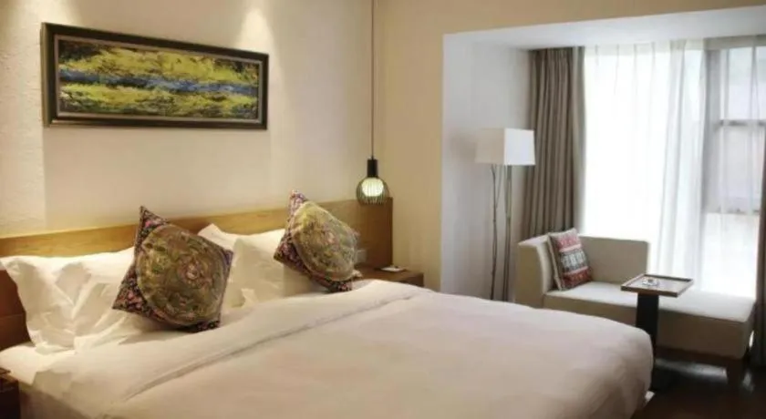 Bed in Ramada by Wyndham Guergou