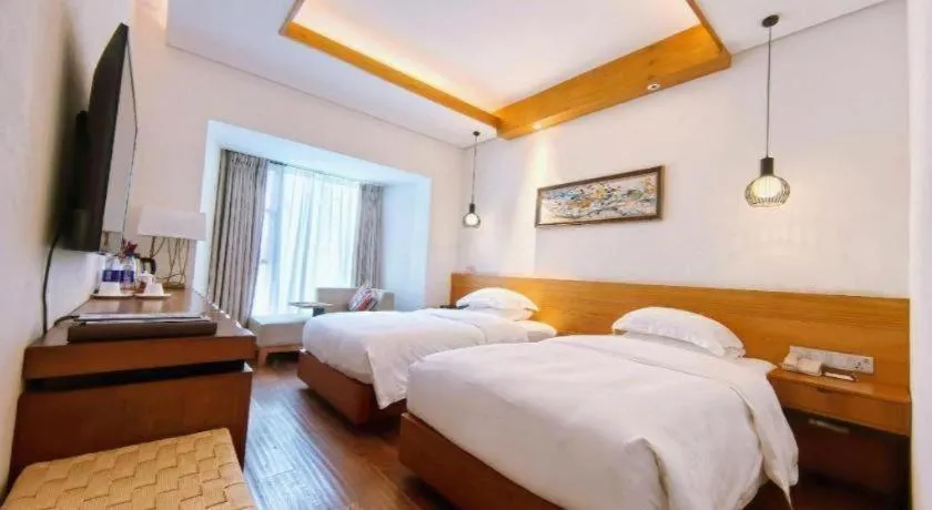 Bed in Ramada by Wyndham Guergou