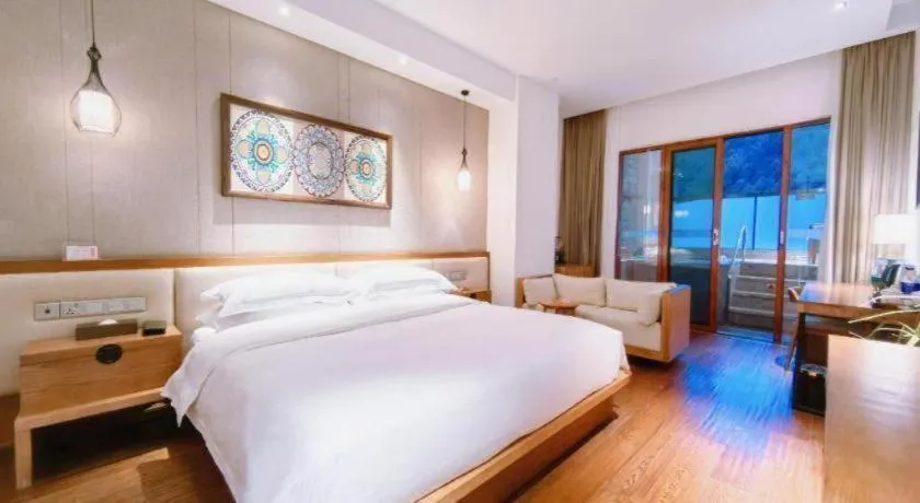 Bed in Ramada by Wyndham Guergou