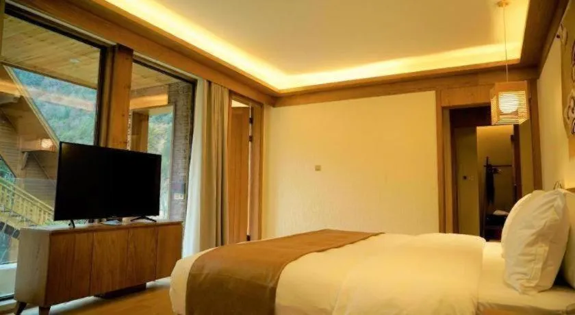 Bed in Ramada by Wyndham Guergou