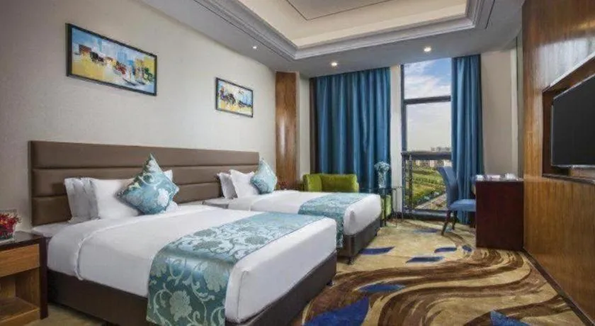 Bed in Ramada by Wyndham Taixing