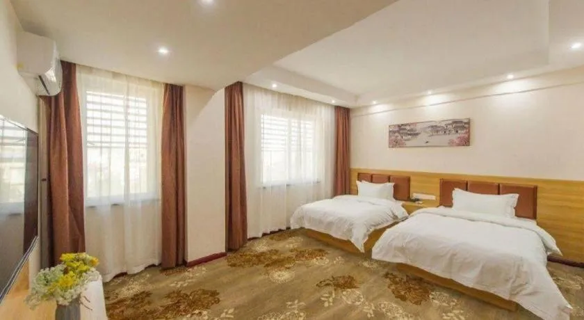 Bed in Guilin Wanjing Hotel