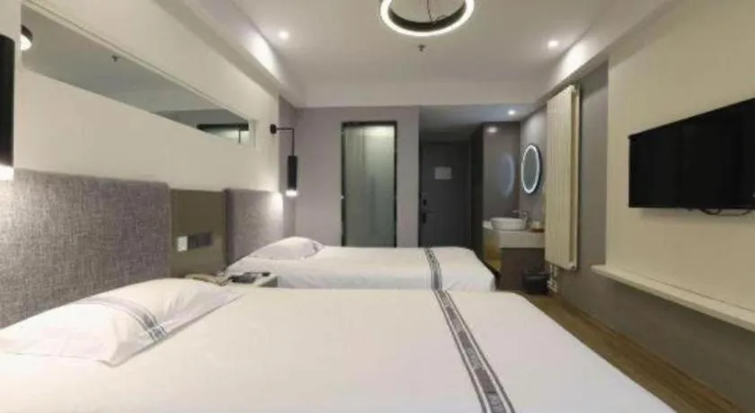 Bed in Urban Garden Hotel Chengyang District Government Liuting Airport