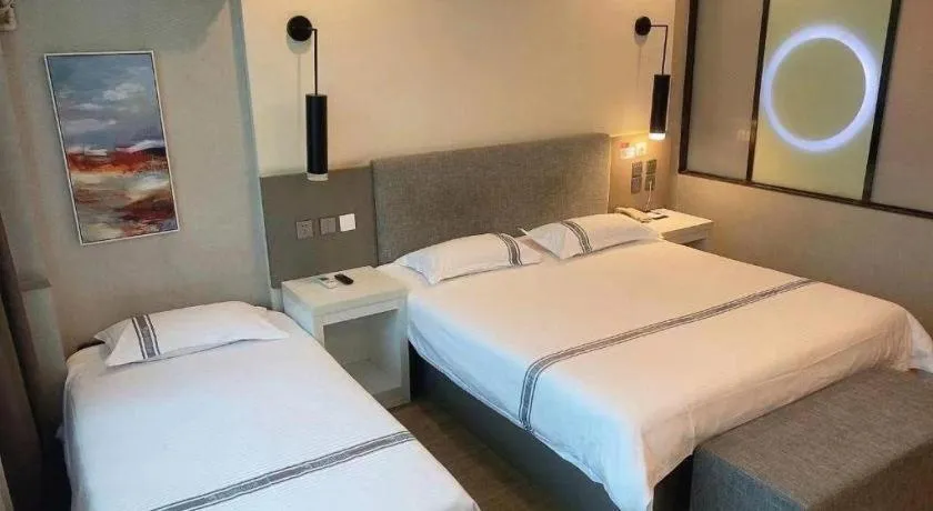 Bed in Urban Garden Hotel Chengyang District Government Liuting Airport