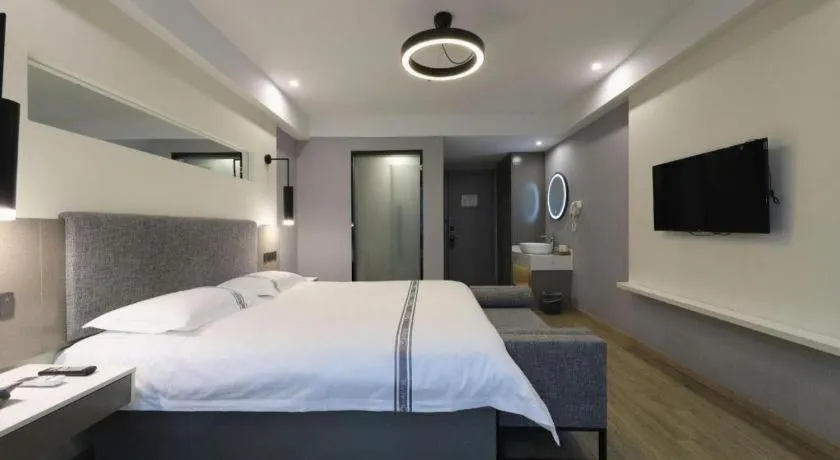 Bed in Urban Garden Hotel Chengyang District Government Liuting Airport