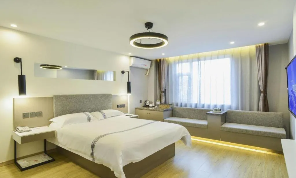 Bed in Urban Garden Hotel Chengyang District Government Liuting Airport