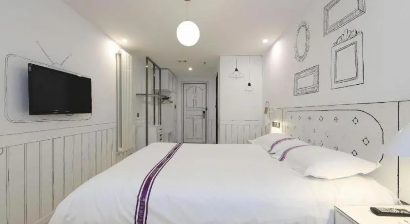 Bed in Urban Garden Hotel Chengyang District Government Liuting Airport