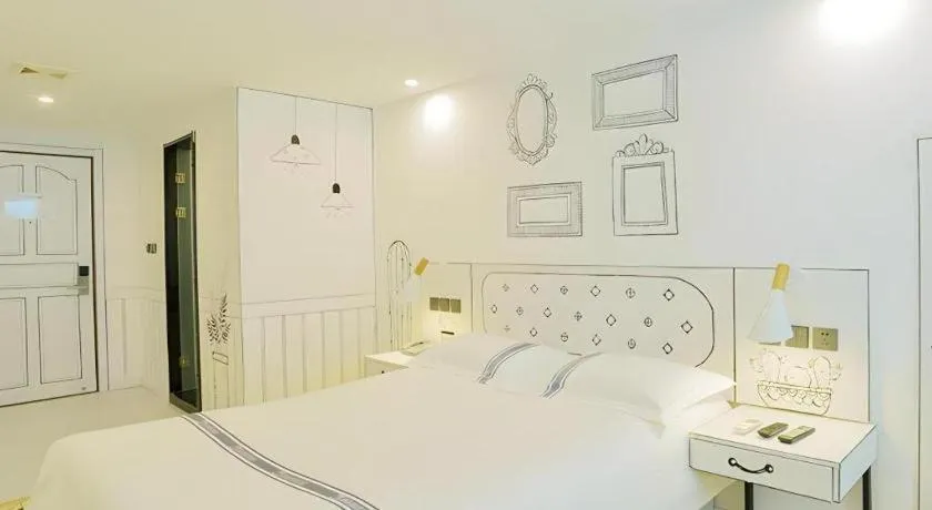 Bed in Urban Garden Hotel Chengyang District Government Liuting Airport