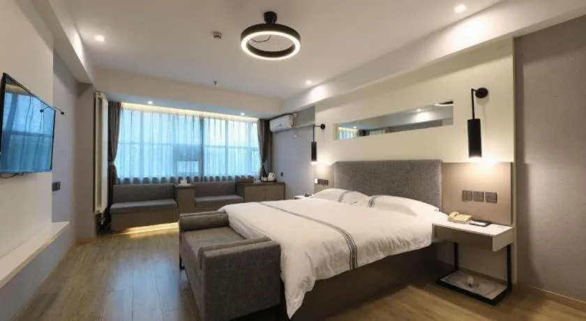 Bed in Urban Garden Hotel Chengyang District Government Liuting Airport