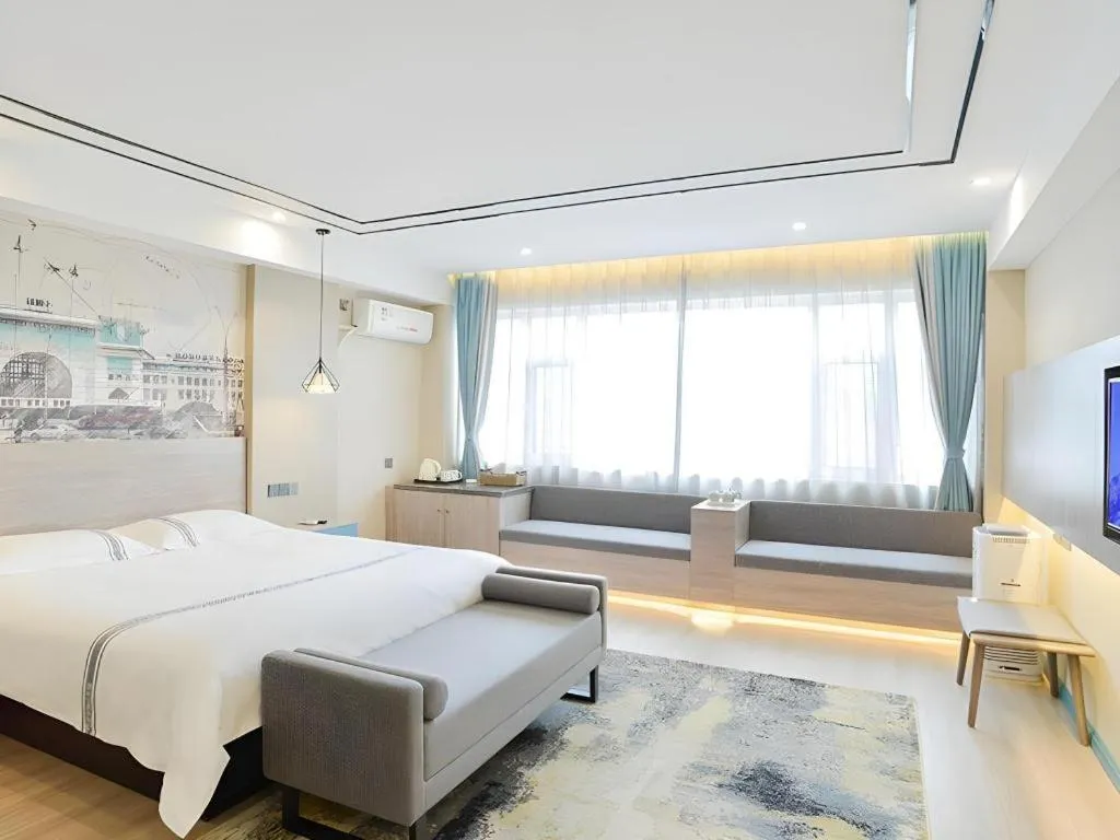 Bed in Urban Garden Hotel Chengyang District Government Liuting Airport