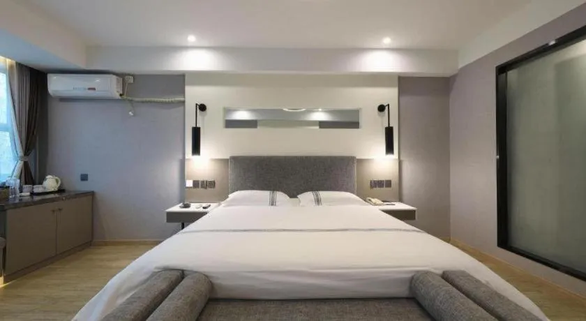 Bed in Urban Garden Hotel Chengyang District Government Liuting Airport