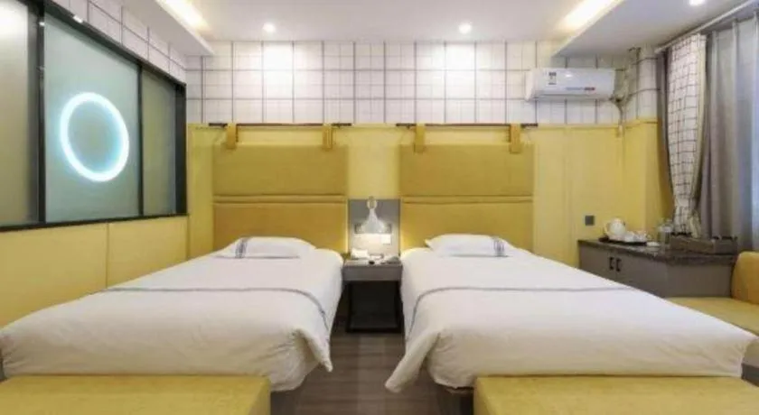 Bed in Urban Garden Hotel Chengyang District Government Liuting Airport