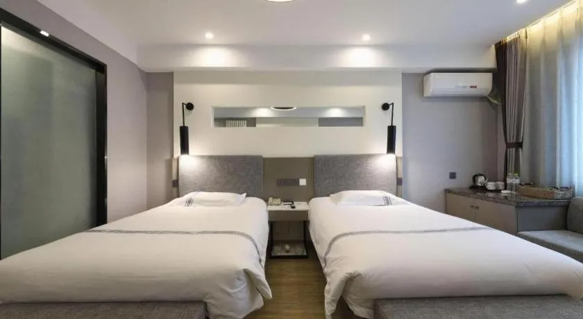 Bed in Urban Garden Hotel Chengyang District Government Liuting Airport