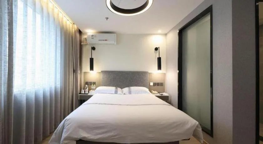 Bed in Urban Garden Hotel Chengyang District Government Liuting Airport