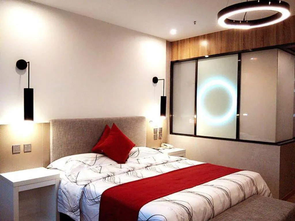 Bed in Urban Garden Hotel Chengyang District Government Liuting Airport