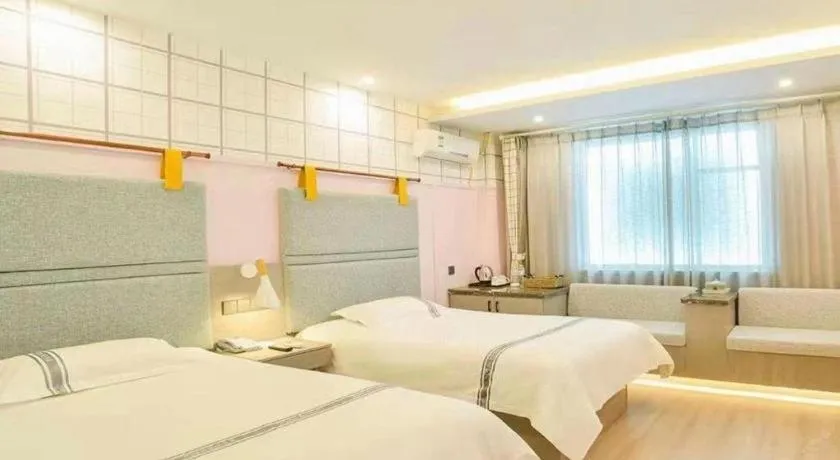 Bed in Urban Garden Hotel Chengyang District Government Liuting Airport