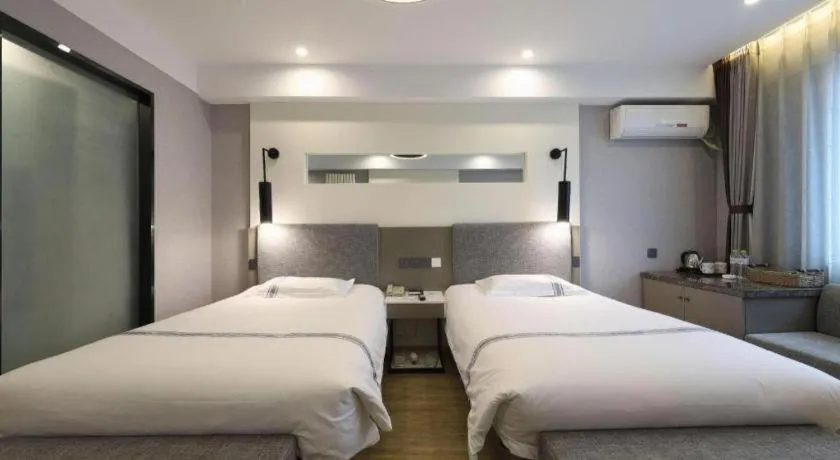 Bed in Urban Garden Hotel Chengyang District Government Liuting Airport