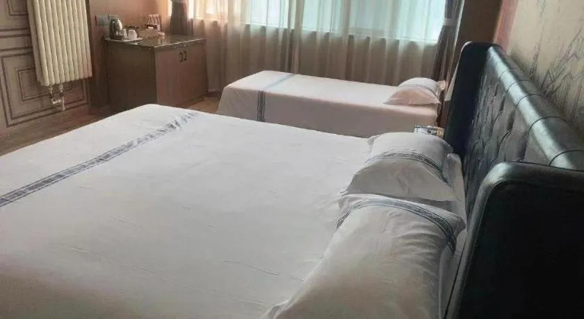 Bed in Urban Garden Hotel Chengyang District Government Liuting Airport