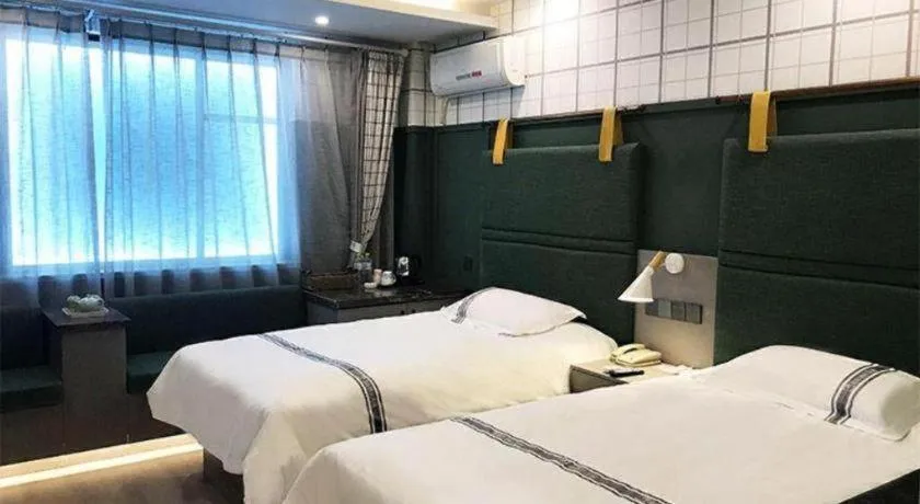 Bed in Urban Garden Hotel Chengyang District Government Liuting Airport