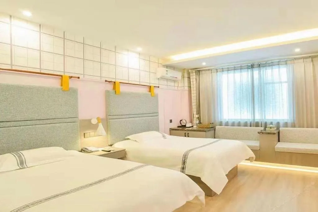 Bed in Urban Garden Hotel Chengyang District Government Liuting Airport