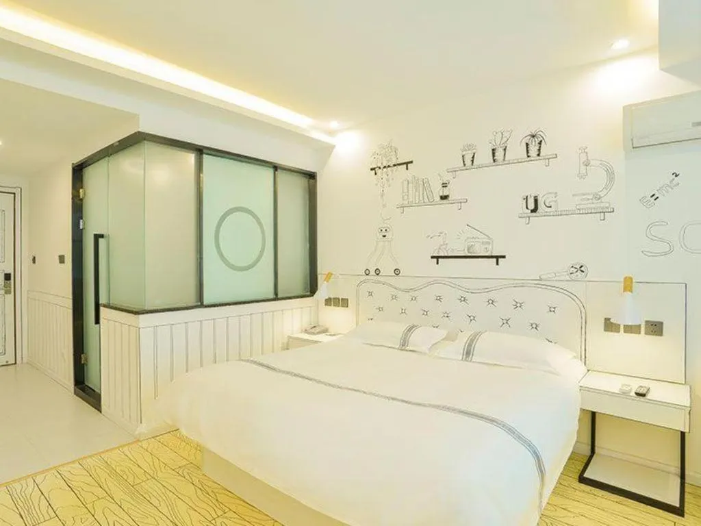 Bed in Urban Garden Hotel Chengyang District Government Liuting Airport