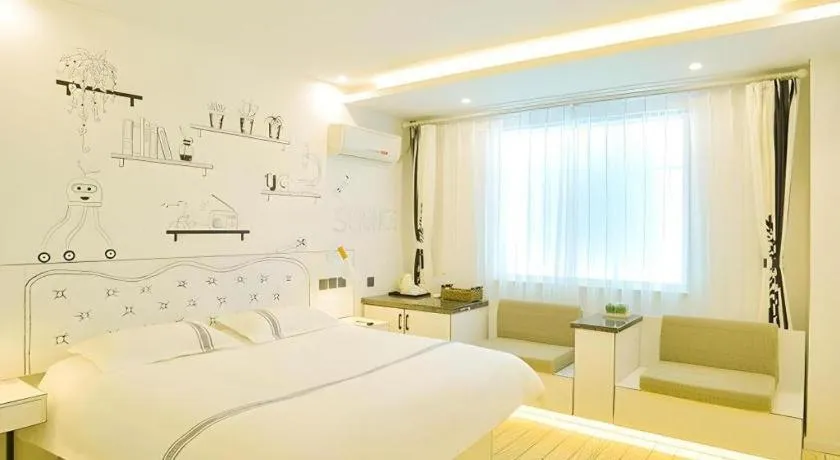 Bed in Urban Garden Hotel Chengyang District Government Liuting Airport