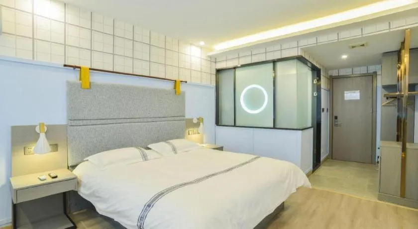 Bed in Urban Garden Hotel Chengyang District Government Liuting Airport