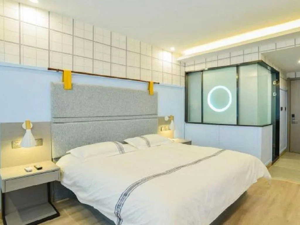 Bed in Urban Garden Hotel Chengyang District Government Liuting Airport