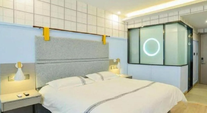 Bed in Urban Garden Hotel Chengyang District Government Liuting Airport