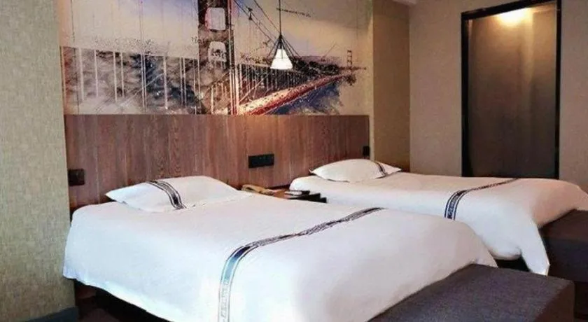 Bed in Urban Garden Hotel Chengyang District Government Liuting Airport