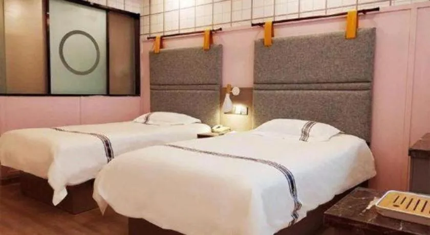 Bed in Urban Garden Hotel Chengyang District Government Liuting Airport