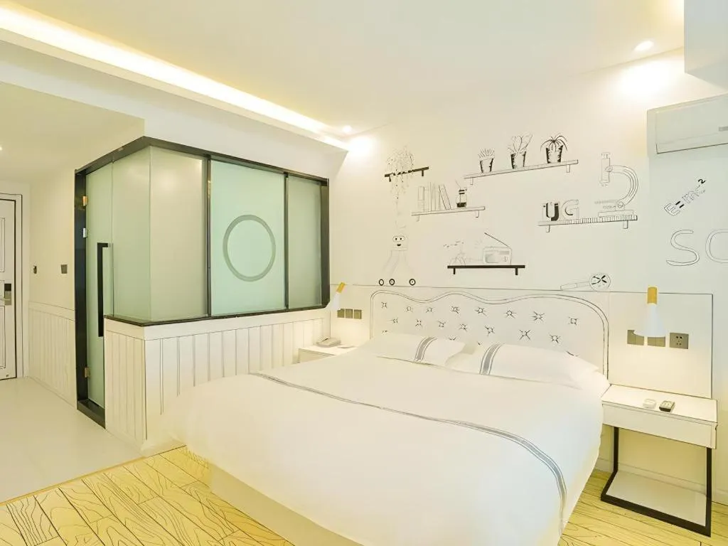 Bed in Urban Garden Hotel Chengyang District Government Liuting Airport