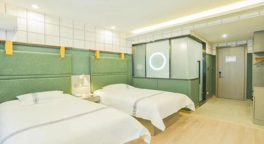 Bed in Urban Garden Hotel Chengyang District Government Liuting Airport