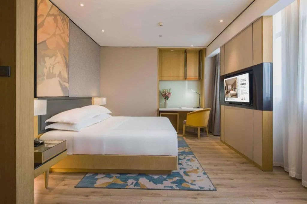 Bed in The Hotel V Nanjing Lishui