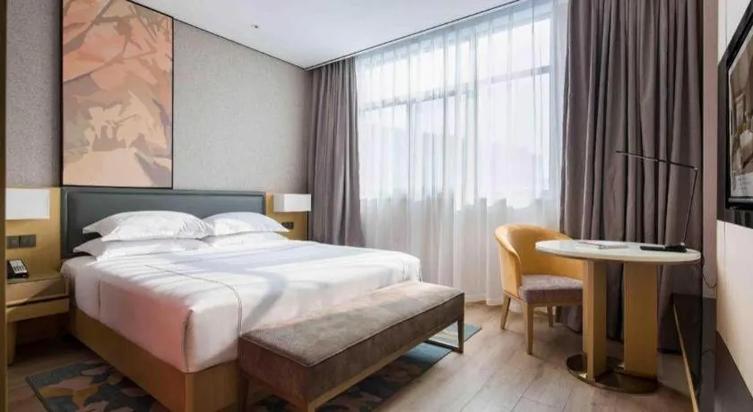 Bed in The Hotel V Nanjing Lishui