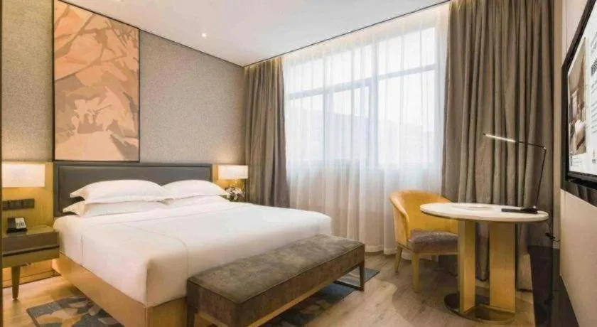 Bed in The Hotel V Nanjing Lishui