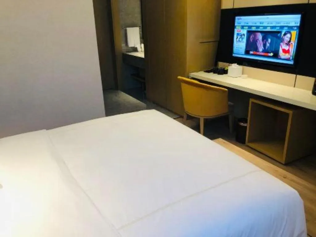 Bed in The Hotel V Nanjing Lishui