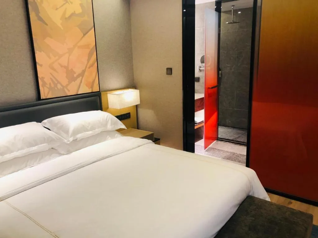 Bed in The Hotel V Nanjing Lishui