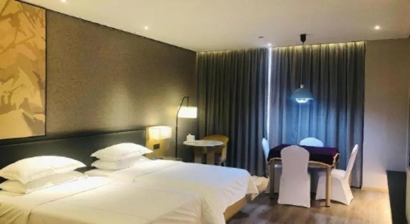 Bed in The Hotel V Nanjing Lishui