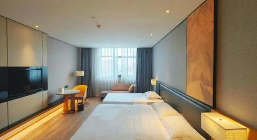 Bed in The Hotel V Nanjing Lishui