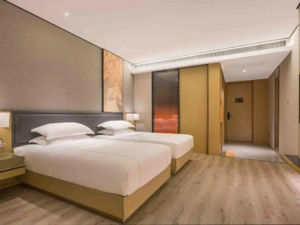 Bed in The Hotel V Nanjing Lishui