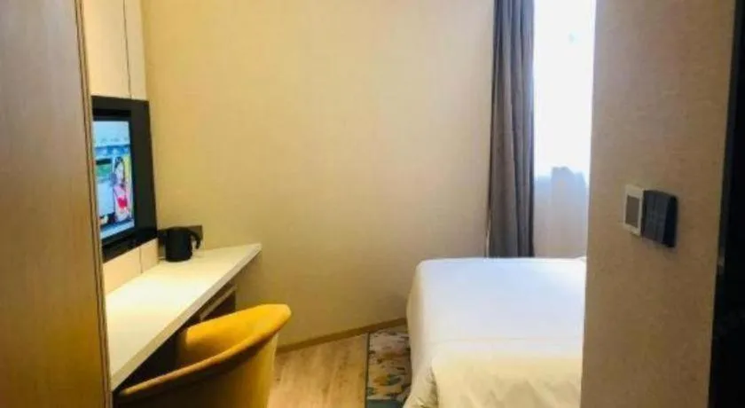 Bed in The Hotel V Nanjing Lishui