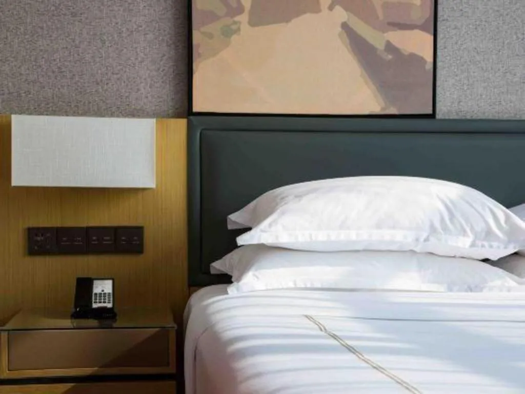 Bed in The Hotel V Nanjing Lishui